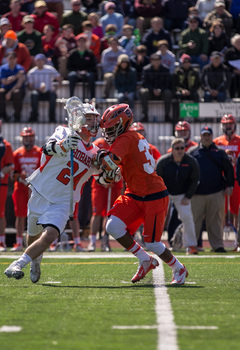 Syracuse midfielder Drew Jenkins guards Hobart's Brendan Saylor.