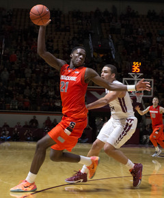 Roberson runs down a long offensive rebound and grabs it with his right hand. The sophomore forward had a double-double on the day, totaling 11 points and 17 rebounds.