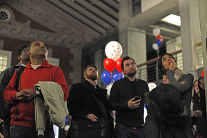 Students, faculty of the Maxwell School of Citizenship and Public Affairs gather at Strasser Commons in Eggers Hall, awaiting results of the elections. 