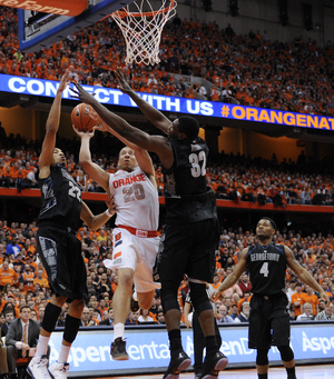 Brandon Triche attempts a layup in Syracuse's 57-46 loss to Georgetown on Saturday. The Orange shot only 34 percent from the field.