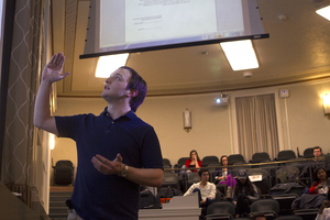 Parliamentarian Ben Jones speaks at the Student Association meeting Monday night. Jones introduced a bill that would allow excused absences to go unpunished for up to three weeks in a row.