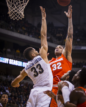 Dajuan Coleman scored just two points and grabbed just one rebound, but Syracuse broke when its most physical player fouled out. 