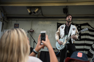 PUBLIC's lead singer jams during the band's Friday performance at Mayfest. The band performed first among the sets. 