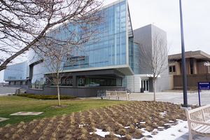 The lawn near the S.I. Newhouse School of Public Communications and Crouse Drive is currently being torn up as part of a campus utility work project.