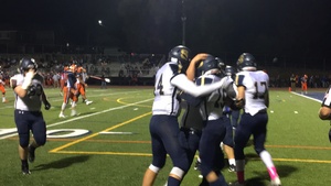 Skaneateles celebrates after soccer player turned football player Zach Sears, a senior, caught a late touchdown.