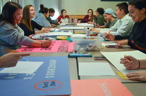 Last Friday, members of the Native Student Program prepared signs for the annual Indigenous Peoples Day rally in Columbus Square. The event is scheduled to take place at 4:30 p.m on Monday and will feature local speakers and performers.