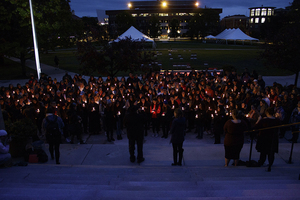 More than 100 people attended a Sunday vigil on the steps of Hendricks Chapel.