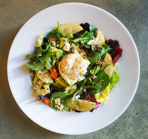 Daisy’s salad included a poached egg, apples, feta cheese and za’atar.