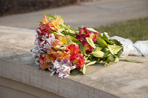 Flowers lay on the Wall of Remembrance for the ceremony, which is held every year at 2:03 p.m. on Dec. 21, the exact date and time when the plane exploded over Lockerbie, Scotland, in 1988.