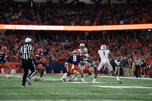 Garrett Williams (pictured No. 8) finished three tackles and helped hold the Cavaliers to 138 passing yards.