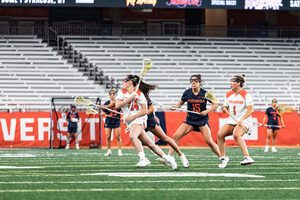 Emma Ward's 10 points, including a goal in the last second of the first quarter, along with nine points from Meaghan Tyrrell led the Orange to victory.