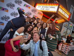 Students from Syracuse University and the Universidad del Sagrado Corazón pose for a photograph at the Syracuse International Film Festival. The film also screened at the Puerto Rico Film Festival.