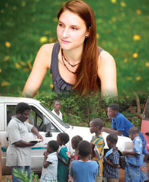 Rachel Mohler, a freshman photojournalism major, spent 160 days in Malawi, Africa. The pastor Mohler lived with during her time there goes over the homework of children who live in the orphanage.