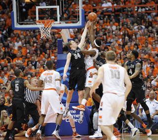 C.J. Fair is rejected by Nate Lubick in Saturday night's loss to the Hoyas.