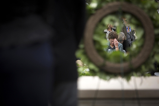 Chancellor Nancy Cantor and other members of the Syracuse community honor the 35 SU students who died in the bombing of Pan Am Flight 103 at Remembrance Week’s Rose Laying Ceremony on Friday.