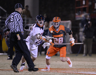 Peter Macartney loses a faceoff. He was one of four players that SU head coach John Desko tried at the faceoff X in the contest. 