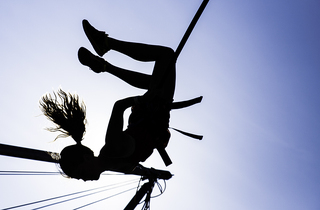 Emily Augello, 13, of Camilus, flies high in the air while strapped onto Quad Power Jump at The Great New York State Fair. Other activities for fair-goers include the Zombie Apocalypse and the Discover the Dinosaurs exhibits, along with the new Dragstrip Mega Slide. Wade Shows brought in 63 new rides when it replaced James E. Strates Shows as the new fair management company.