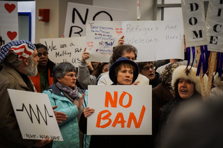 Protester Marcia Nolan (right) also went to the Women's March at Seneca Falls. 