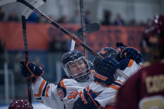 SU celebrates after scoring a goal.