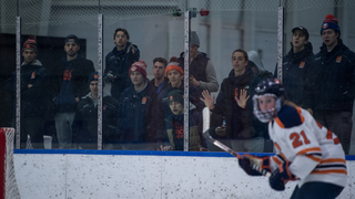 Fans look on toward Brooke Avery.