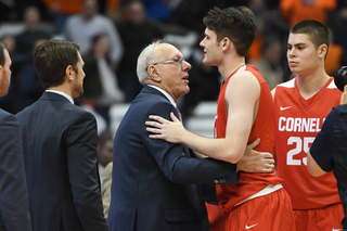 Jimmy Boeheim played in his first game as a freshman for Cornell on Friday night. It was against his dad, SU head coach Jim Boeheim. Friday night's attendance was recorded at 21,720.
