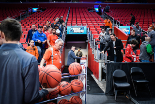 Fans await players and coaches for signatures at Thursday's practice.