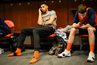 Matthew Moyer and Patrick Herlihy prep for Thursdays game, setting up in the locker room of Little Caesars Arena in Detroit.