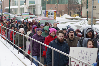 The march started at the Everson Museum of Art and ended at the University United Methodist Church.