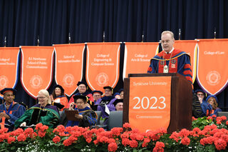 Chancellor and president of SU Kent Syverud and President of SUNY ESF Joanie Mahoney, president of SUNY ESF, address the graduates. Both leaders shared advice and sentimental messages for the graduates to take as they left college.  